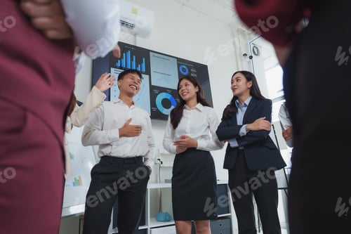 Preview: Business professionals engaging in a collaborative meeting