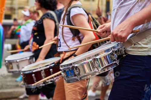 Preview: People with drums in street at demonstration in city