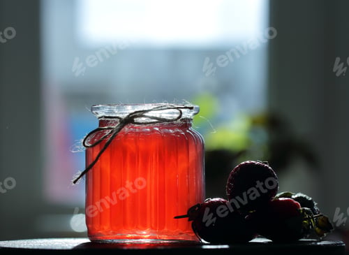 Preview: Jelly Strawberry Standing On The Bank Next To The Table Attributes And Strawberries