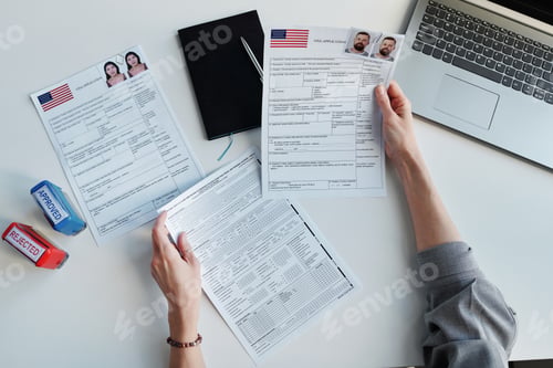 Preview: Checking Visa Application Papers At Office
