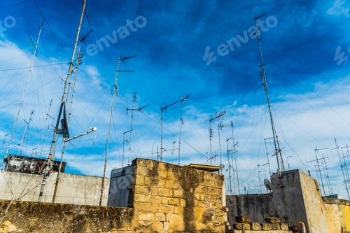 Preview: Old buildings in the city of Bari with roofs full of old television antennas.
