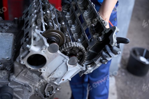 Preview: Repairing a car engine in a car repair shop