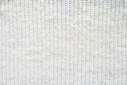 Preview: full frame of white woolen fabric background