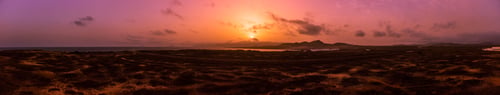 Preview: Panoramic shot of sunrise over volcano and landscape