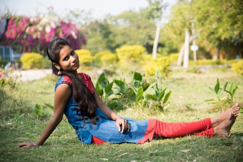 Preview: Outdoor portrait of beautiful young Indian girl in the park