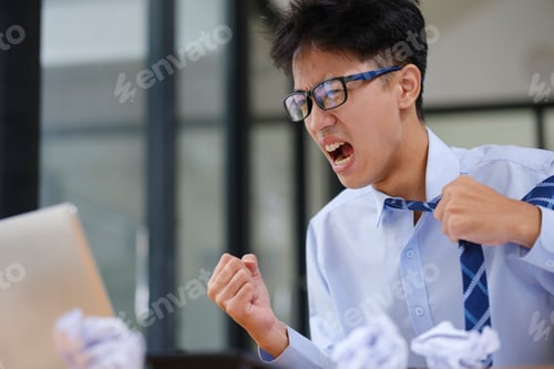 Preview: Frustrated Businessman Yelling at Laptop in Anger