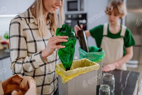 Preview: Woman and Teen Recycling Plastics and Glassware