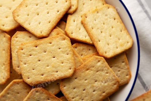 Preview: Oven Baked Crackers on a Plate, top view. Flat lay, overhead, from above.