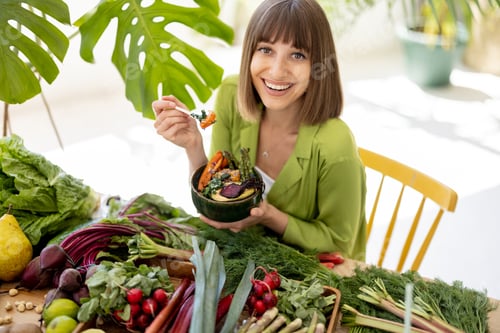 Preview: Woman with fresh healthy food indoors