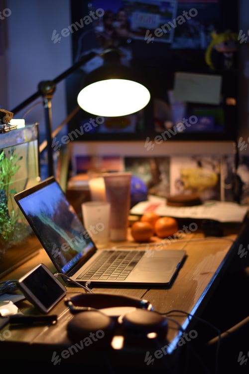 Preview: Vertical shot of a home desk with different devices on it