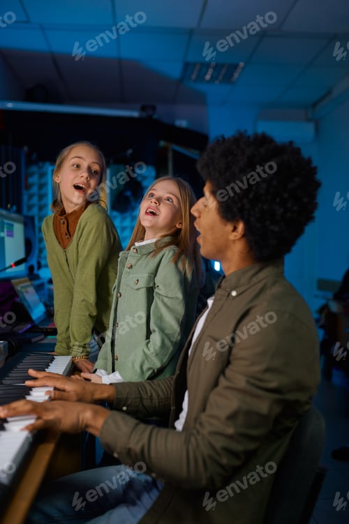 Preview: Children singing song to synthesizer accompaniment