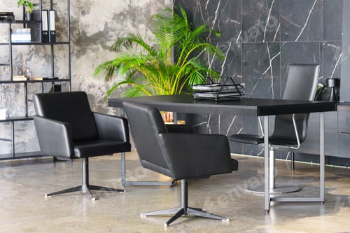 Preview: Modern Loft Office Interior With Black Desk, Leather Chairs And Industrial Library Shelving