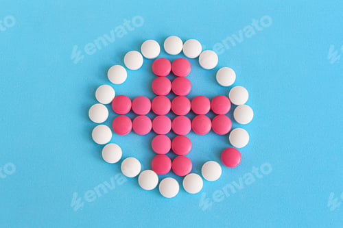 Preview: Cross made from pink and white pills