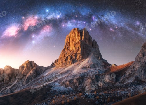 Preview: Milky Way acrh over beautifull rocks at starry night in summer