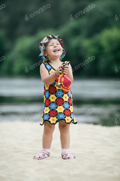 Preview: little girl with bright colorful dress