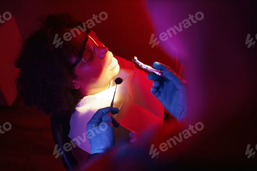 Preview: Receiving Dental Examination with Special Lighting
