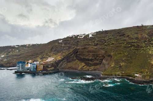 Preview: Rough rocky cliffs in the North of Tenerife.Black beach in the Canary Islands. Rocks, volcanic rocks