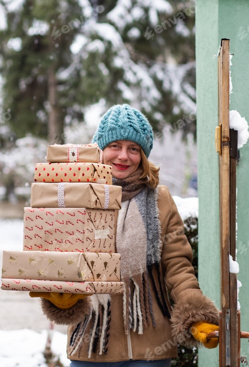 Preview: Woman With Gifts in Winter Wonderland