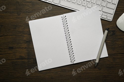 Preview: Blank notebook, pen and wireless keyboard on wooden table. Flat lay, top view with copy space