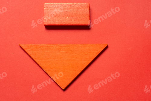 Preview: Orange down arrow on a red background