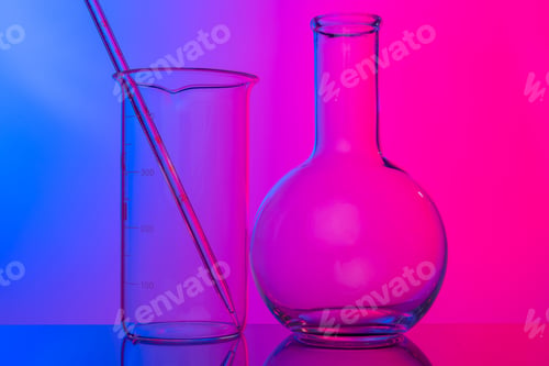 Preview: Chemical glassware close up on neon pink-purple background