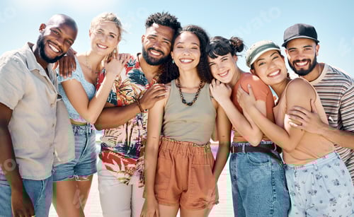 Preview: Shot of a diverse group of friends standing together and bonding during a day outdoors