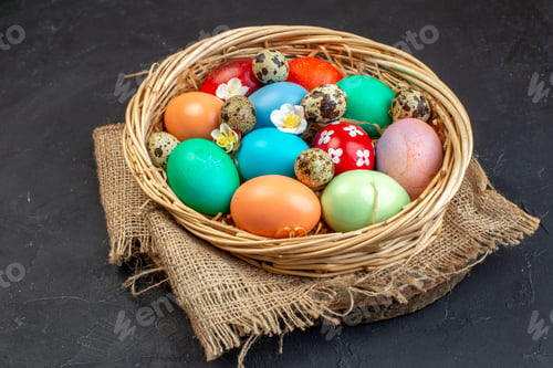 Preview: front view colored easter eggs inside basket on dark surface spring colourful colour concept easter