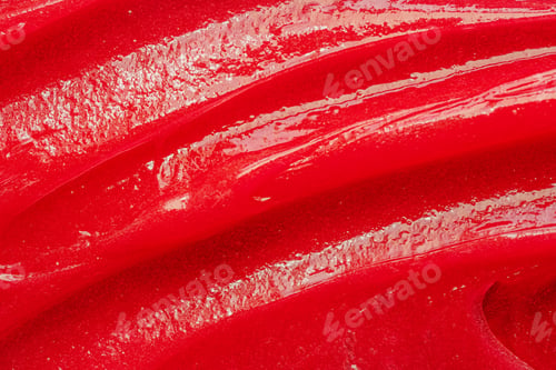 Preview: Red gel texture. Cosmetic clear liquid cream smudge. Skin care product sample closeup. Toothpaste or