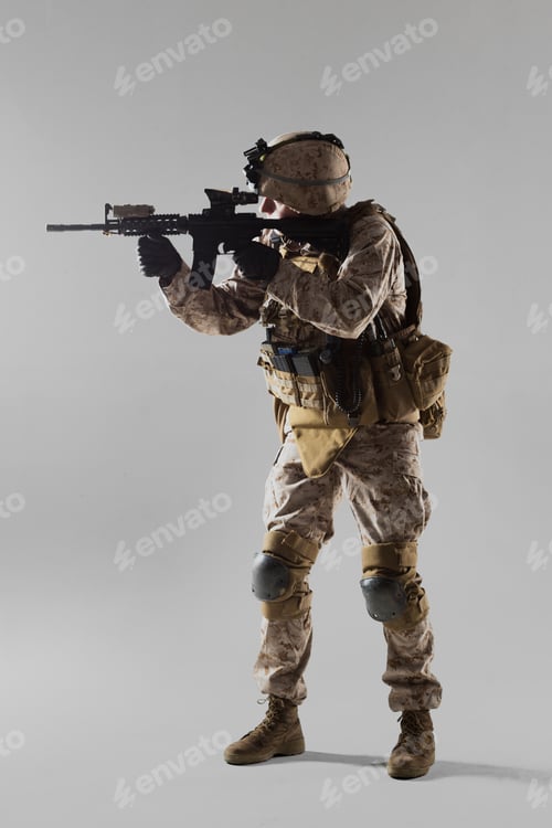 Preview: Soldier prepares for action with rifle in combat stance during training session