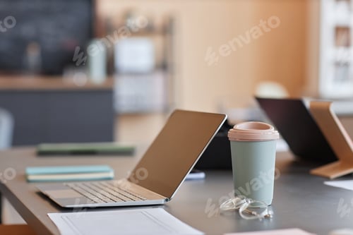 Preview: Background image of office workplace with laptop and pink accents