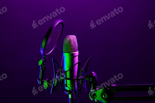 Preview: Professional microphone against black background in studio