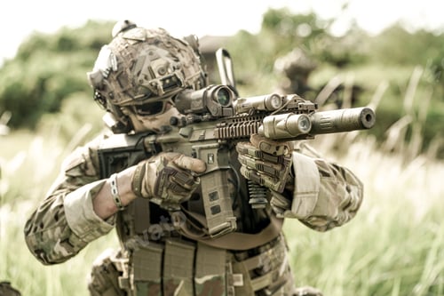 Preview: Soldier in full US MARSOC armed with assault rifle run through the abandoned building. Military
