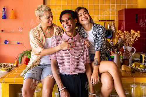 Preview: Three Friends Laughing and Posing in Home Kitchen