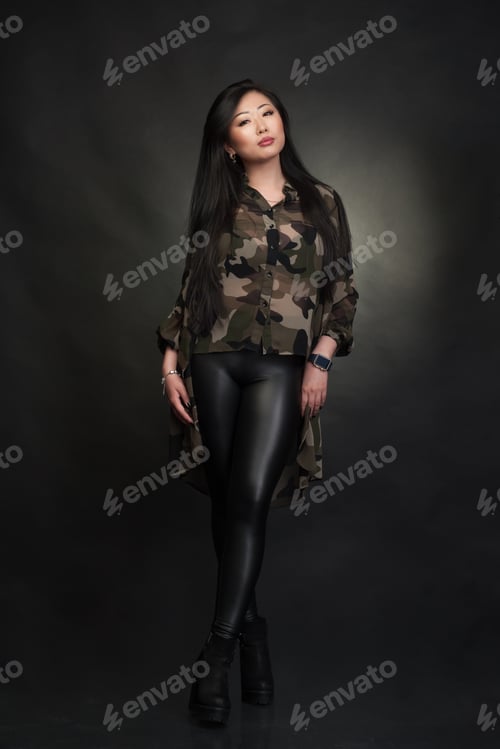 Preview: Asian Woman At Studio In Khaki Clothes