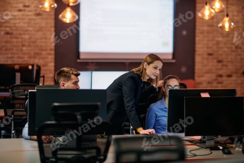 Preview: Strategic Business Meeting: Group of Professionals Collaborating in Office Using Computers