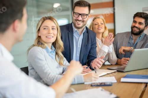 Preview: Business people talking to each other on a meeting in conference room