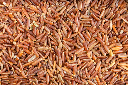 Preview: background - many raw red rice grains