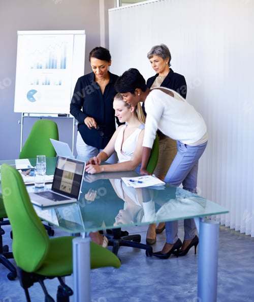 Preview: Shot of a group of coworkers having a meeting in the boardroom