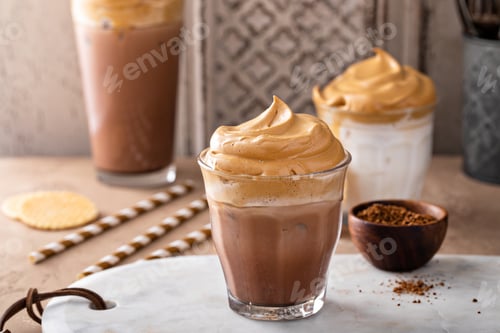 Preview: Chocolate dalgona whipped coffee in a glass with ice