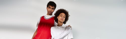 Preview: Young couple embracing love and style in a contemporary setting with artistic flair