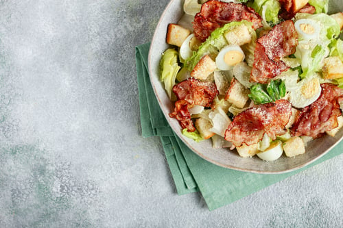 Preview: caesar salad with fried bacon, quail eggs, homemade, no people,