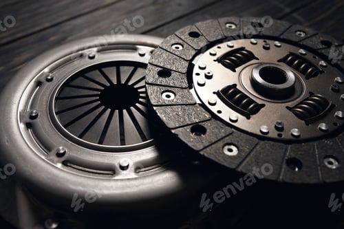 Preview: new car clutch kit on a dark wooden background. Close up