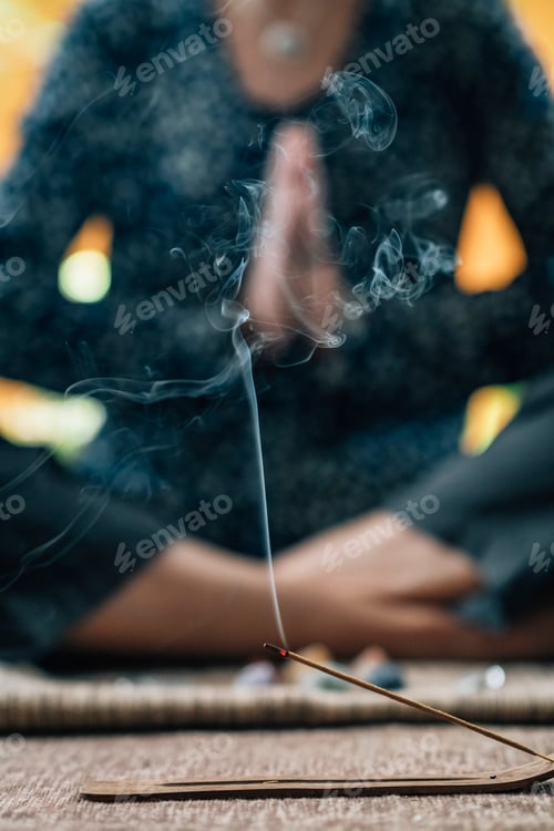 Preview: Mindful Woman in Self-Healing Meditation with Burning Incense Sticks