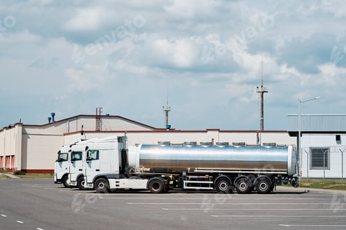 Preview: Trucks with tank trailer on parking lot