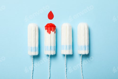 Preview: Tampons for menstrual days on a blue background
