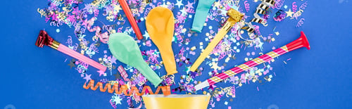 Preview: Panoramic shot of party hat with festive decor on blue background