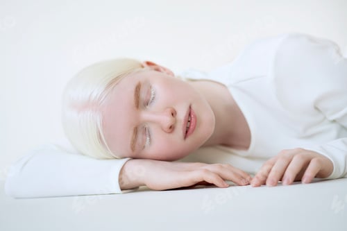 Preview: Albino girl model on white studio background. Inclusive woman.