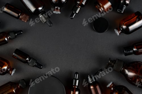 Preview: Various glass bottles arranged on a dark surface