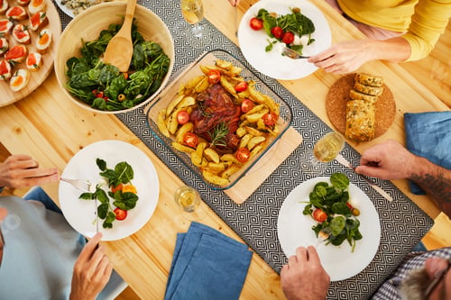 Preview: Roasted pork with potatoes on dining table