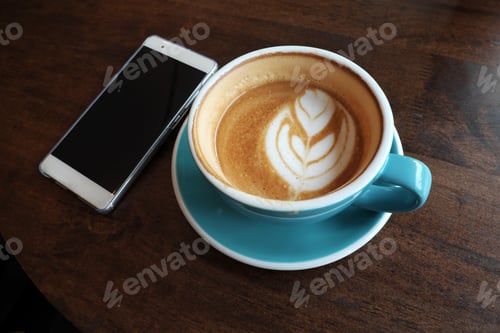 Preview: Hot Latte On A Wooden Table